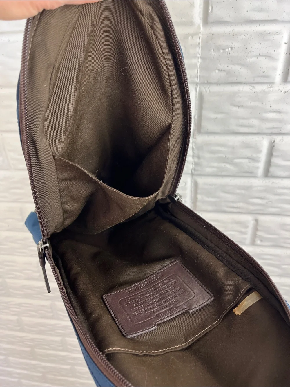 COACH Varick sling bag in navy blue / gray nylon with brown leather trim